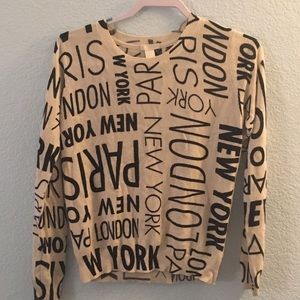 New York and Paris patterned sweater
